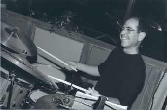 Russell on drums
