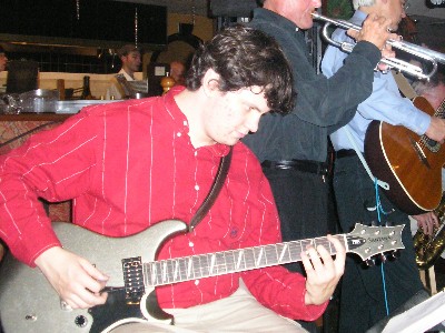 Cole Newsom on guitar